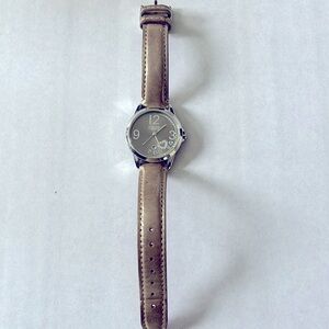Woman’s coach watch with crystal heart